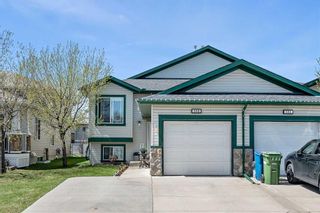 Photo 1: 548 Stonegate Way NW: Airdrie Semi Detached (Half Duplex) for sale : MLS®# A2129674