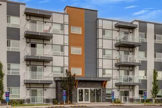Photo 1: 211 360 Harvest Hills Way NE in Calgary: Harvest Hills Apartment for sale : MLS®# A2145938