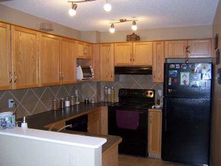 Photo 3: 215 Bayside Point SW: Airdrie Townhouse for sale : MLS®# C3499010
