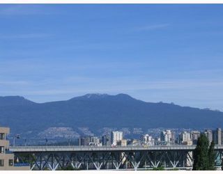 Photo 2: 403 1345 W 4TH Avenue in Vancouver: False Creek Condo for sale in "GRANVILLE ISLAND VILLAGE" (Vancouver West)  : MLS®# V715867