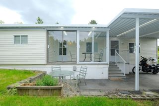 Photo 4: 2103 TYNE Place in Surrey: King George Corridor Manufactured Home for sale (South Surrey White Rock)  : MLS®# R2696557