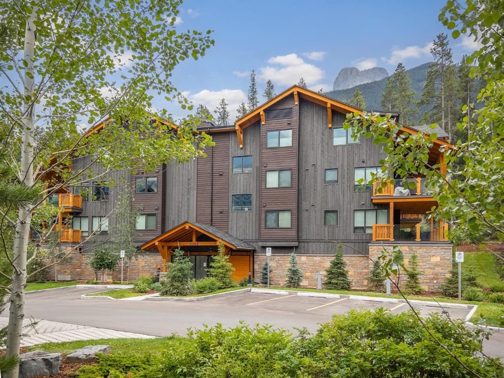 Main Photo: 201 3000E Stewart Creek Drive: Canmore Apartment for sale : MLS®# A1245269