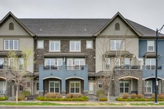 Main Photo: 426 Quarry Way SE in Calgary: Douglasdale/Glen Row/Townhouse for sale : MLS®# A2054308