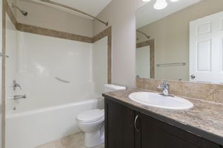 Photo 17: 58 Arbours Circle NW: Langdon Row/Townhouse for sale : MLS®# A1137898