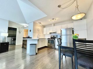 Photo 3: 405 10 Sierra Morena Mews SW in Calgary: Signal Hill Apartment for sale : MLS®# A2030186