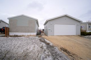 Photo 1: 703 Willow Bay in Portage la Prairie: House for sale : MLS®# 202406470