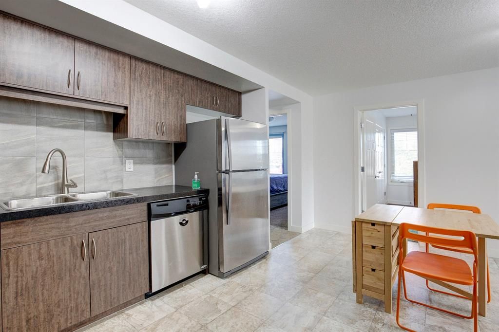 Photo 8: Photos: 403 250 Sage Valley Road NW in Calgary: Sage Hill Row/Townhouse for sale : MLS®# A1182895