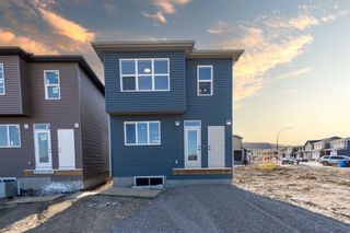 Photo 2: 26 WOLF CREEK Rise SE in Calgary: C-281 Detached for sale : MLS®# A2079870