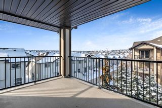 Photo 1: 1426 60 Panatella Street NW in Calgary: Panorama Hills Apartment for sale : MLS®# A2031014
