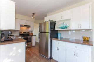 Photo 8: 205 2780 WARE Street in Abbotsford: Central Abbotsford Condo for sale in "Chelsea House" : MLS®# R2224498