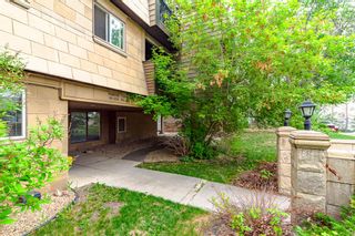 Photo 2: 305 60 38A Avenue SW in Calgary: Parkhill Apartment for sale : MLS®# A2050079