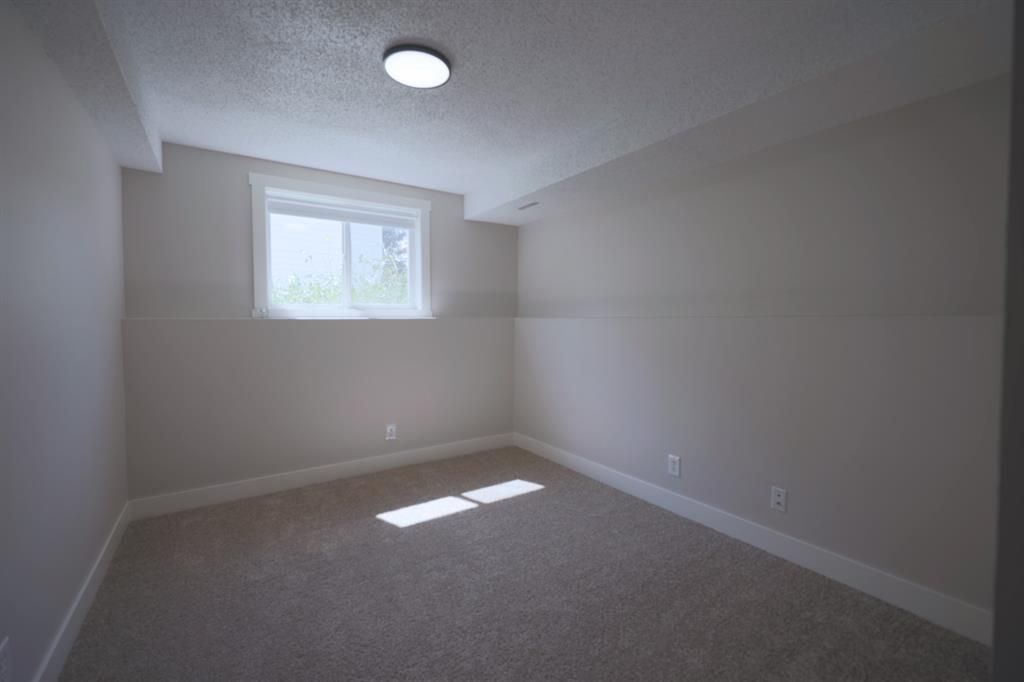 Photo 39: Photos: 111 Woodside Circle NW: Airdrie Detached for sale : MLS®# A1245479