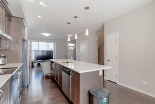 Photo 12: 107 Panatella Walk NW in Calgary: Panorama Hills Row/Townhouse for sale : MLS®# A1190534