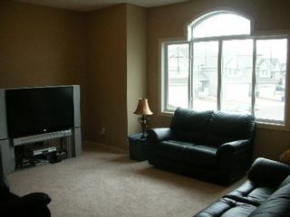 Photo 5: 1212 - 84 Street  SW: House for sale (Summerside) 