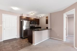 Photo 4: 2216 403 Mackenzie Way SW: Airdrie Apartment for sale : MLS®# A2015539