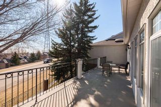 Photo 25: 63 Prominence Point SW in Calgary: Patterson Semi Detached (Half Duplex) for sale : MLS®# A2115776