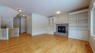 Photo 10: 48 Moreuil Court SW in Calgary: Garrison Woods Detached for sale : MLS®# A1075333