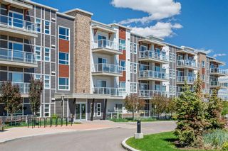 Photo 1: 404 360 Harvest Hills Common NE in Calgary: Harvest Hills Apartment for sale : MLS®# A2139353