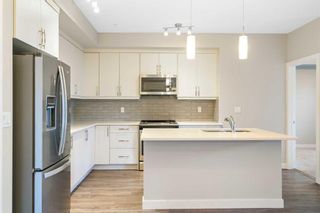 Photo 2: 111 300 Auburn Meadows Manor SE in Calgary: Auburn Bay Apartment for sale : MLS®# A2096918