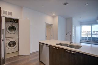 Photo 3: 615 88 9 Street NE in Calgary: Bridgeland/Riverside Apartment for sale : MLS®# A1172279