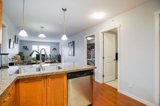 Photo 6: PH2 2373 ATKINS Avenue in Port Coquitlam: Central Pt Coquitlam Condo for sale in "Carmandy" : MLS®# R2545305