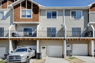 Photo 1: 103 2802 Kings Heights Gate SE: Airdrie Row/Townhouse for sale : MLS®# A2049602