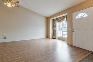 Photo 5: 4 209 Woodside Drive NW: Airdrie Row/Townhouse for sale : MLS®# A1206898