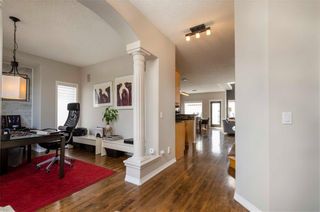 Photo 2: 1302 STRATHCONA Drive SW in Calgary: Strathcona Park Detached for sale : MLS®# C4235711