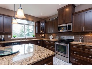 Photo 7: 34270 FRASER Street in Abbotsford: Central Abbotsford House for sale : MLS®# R2557795