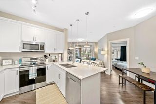Photo 5: 106 110 Auburn Meadows View SE in Calgary: Auburn Bay Apartment for sale : MLS®# A1217350