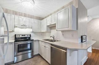 Photo 12: 174 Mt Aberdeen Manor SE in Calgary: McKenzie Lake Row/Townhouse for sale : MLS®# A2099841