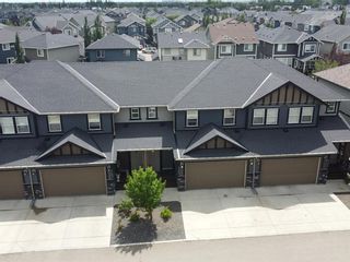 Photo 2: 1102 1086 Williamstown Boulevard NW: Airdrie Row/Townhouse for sale : MLS®# A1245751