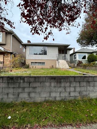 Photo 1: 815 E 56TH Avenue in Vancouver: South Vancouver House for sale (Vancouver East)  : MLS®# R2882907