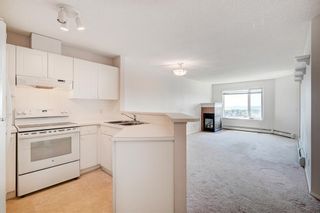 Photo 6: 1304 950 Arbour Lake Road NW in Calgary: Arbour Lake Apartment for sale : MLS®# A2054654
