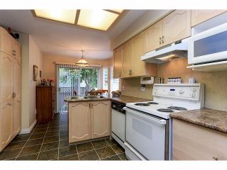 Photo 8: 33 9168 FLEETWOOD Way in Surrey: Fleetwood Tynehead Townhouse for sale in "The Fountains" : MLS®# F1414728