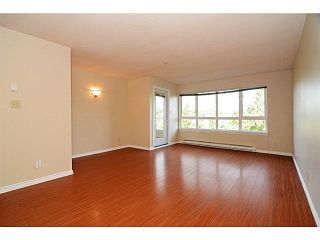 Photo 2: 403 4950 MCGEER STREET in Vancouver: Collingwood VE Condo for sale (Vancouver East)  : MLS®# V1142563
