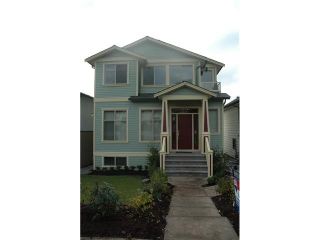 Photo 1: 3686 E GEORGIA Street in Vancouver: Renfrew VE House for sale (Vancouver East)  : MLS®# V1040327
