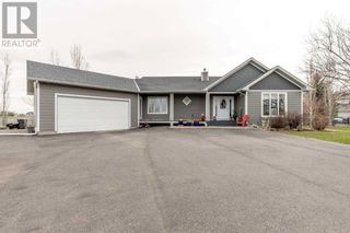 Photo 1: 219 Falcon Ridge Way in Rural Lethbridge County: House for sale : MLS®# A2123087