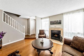 Photo 5: 13 Woodhill Court SW in Calgary: Woodlands Row/Townhouse for sale : MLS®# A1209374