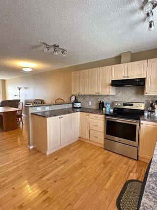 Photo 8: 305 Prairie Sound Circle NW: High River Row/Townhouse for sale : MLS®# A2130103