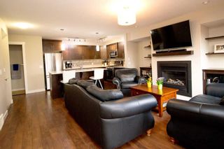 Photo 11: 208 Redstone View NE in Calgary: Redstone Row/Townhouse for sale : MLS®# A2072965