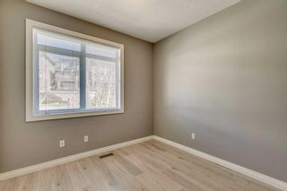 Photo 21: 19 133 Rockyledge View NW in Calgary: Rocky Ridge Row/Townhouse for sale : MLS®# A2118493