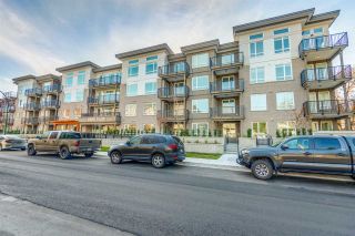 Photo 1: 311 2382 ATKINS Avenue in Port Coquitlam: Central Pt Coquitlam Condo for sale in "Parc East" : MLS®# R2418133