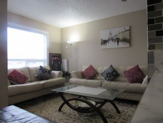 Photo 3: 1580 Mill Woods Road East in Edmonton: House Duplex for sale or rent