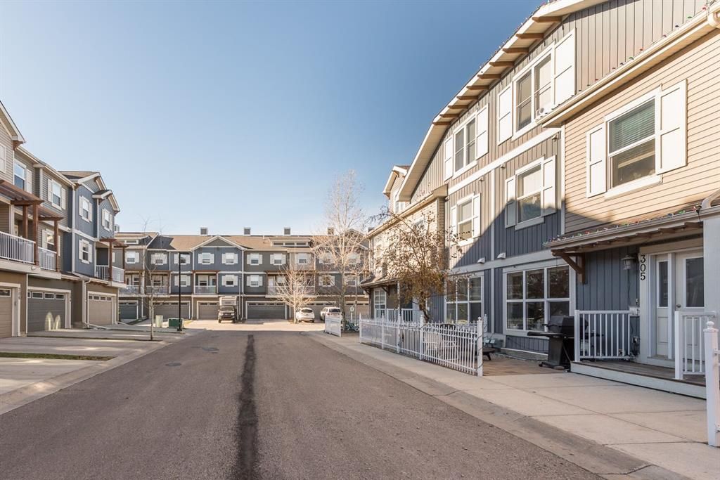 Main Photo: 309 10 Auburn Bay Avenue SE in Calgary: Auburn Bay Row/Townhouse for sale : MLS®# A2093360
