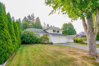 Photo 2: 1034 162 Street in Surrey: King George Corridor House for sale in "McNally Creek" (South Surrey White Rock)  : MLS®# R2616831