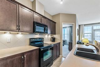 Photo 6: 323 1 Crystal Green Lane: Okotoks Apartment for sale : MLS®# A1086954