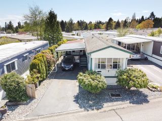 Photo 1: 15878 NORFOLK Road in Surrey: King George Corridor Manufactured Home for sale in "CRANLEY PLACE" (South Surrey White Rock)  : MLS®# R2682652