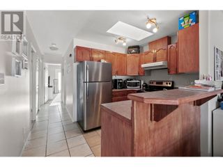 Photo 9: 292 DOUGLAS Avenue Unit# 101 in Penticton: House for sale : MLS®# 10307099