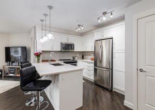 Photo 5: 207 110 Auburn Meadows View SE in Calgary: Auburn Bay Apartment for sale : MLS®# A1213346